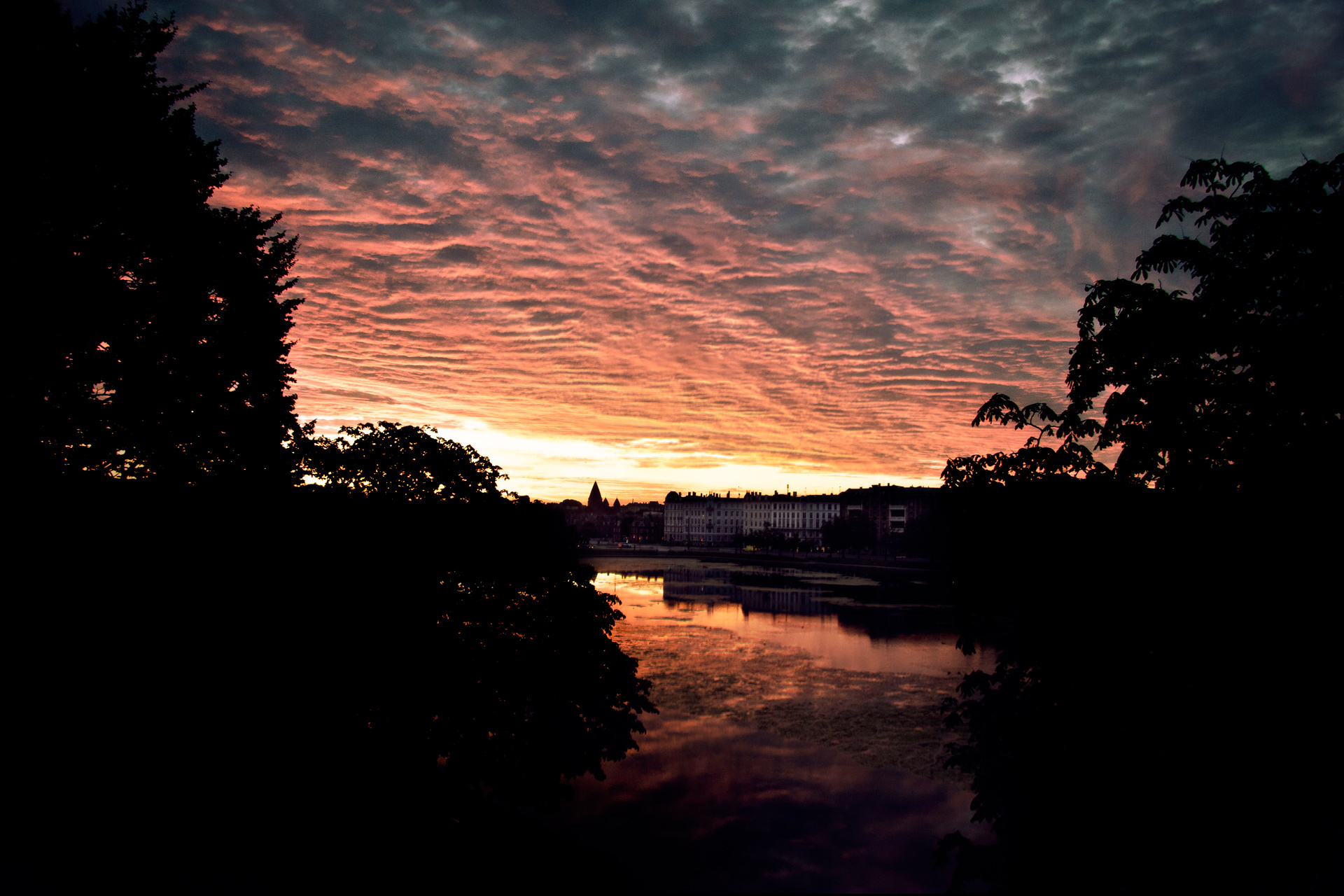 Sunrise over Sortedamssøen viewed from Sortedamsdoseringen